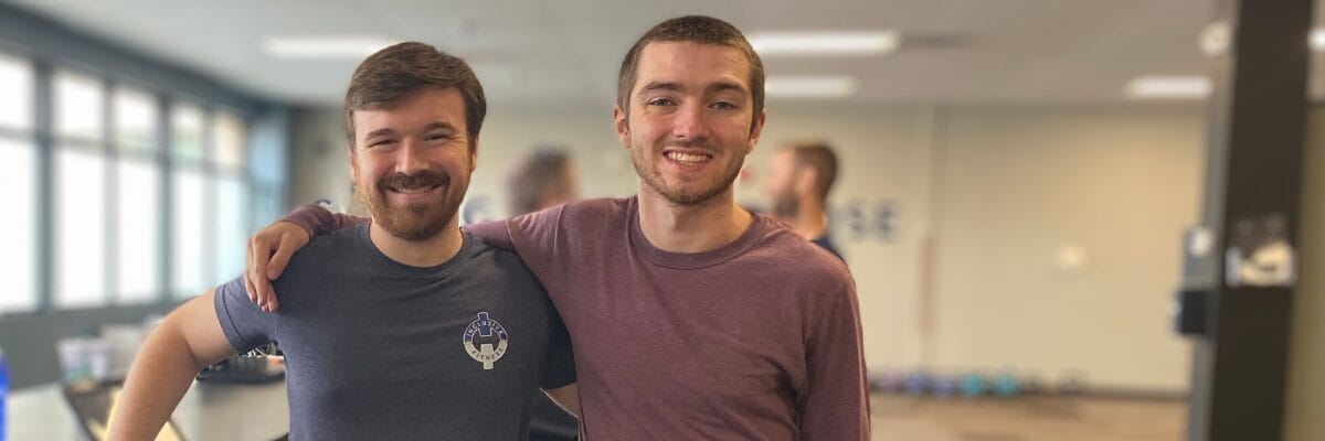 Inclusive Fitness Two Men Smiling